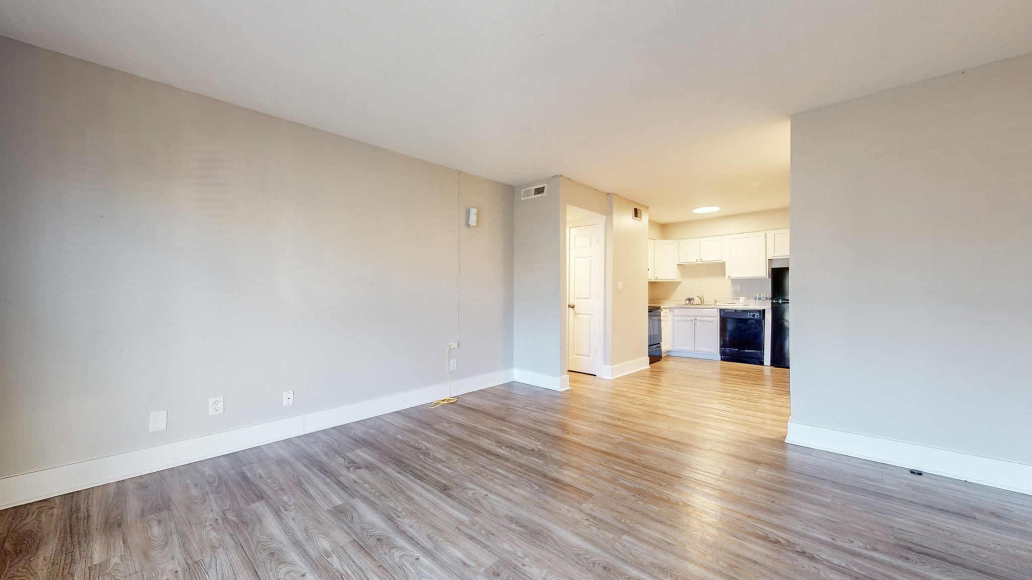 320 Welch Road, Unit P2 Nashville, TN 37211 - Photo 11 of 22 a view of an empty room with wooden floor