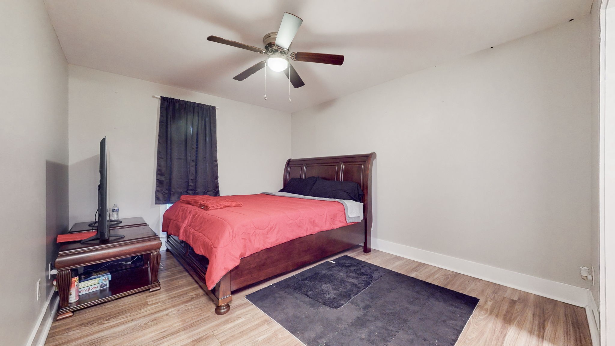 320 Welch Road, Unit P2 Nashville, TN 37211 - Photo 12 of 22 a bedroom with a bed and wooden floor