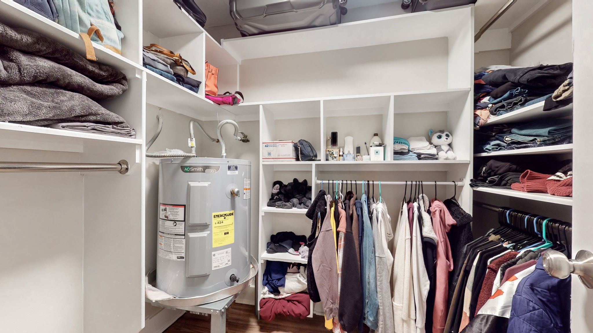 320 Welch Road, Unit P2 Nashville, TN 37211 - Photo 14 of 22 a view of walk in closet with clothes and shoes