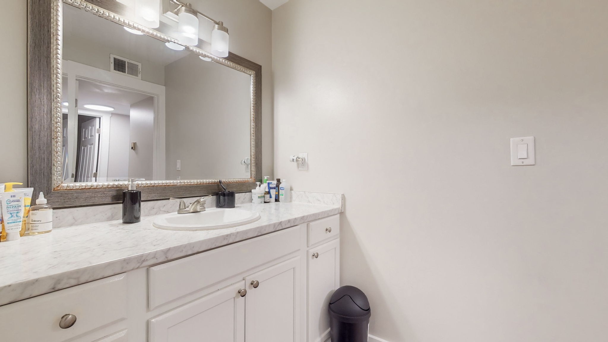 320 Welch Road, Unit P2 Nashville, TN 37211 - Photo 16 of 22 a bathroom with a sink and a mirror