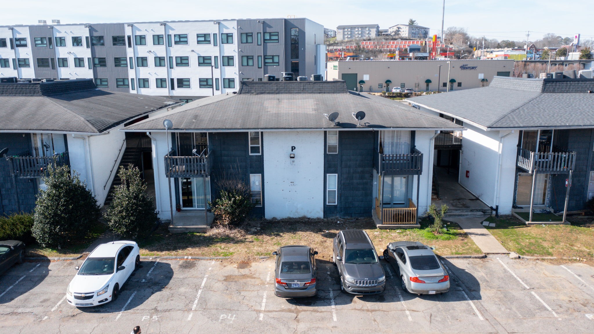 320 Welch Road, Unit P2 Nashville, TN 37211 - Photo 18 of 22 a front view of a building and car parked
