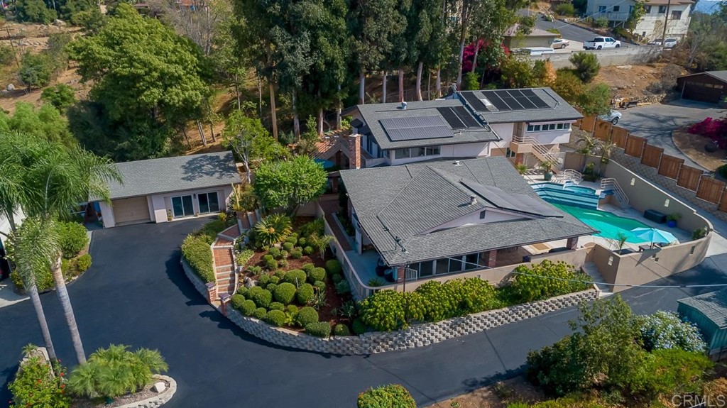 1239 Jamacha Road El Cajon, CA 92019 - Photo 1 of 24 an aerial view of a house with garden space and street view