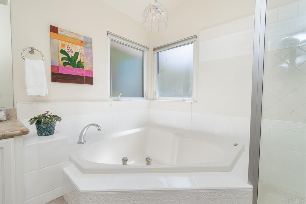 1239 Jamacha Road El Cajon, CA 92019 - Photo 12 of 24 a bathroom with a bathtub