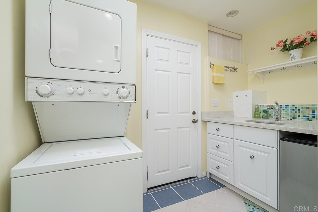 1239 Jamacha Road El Cajon, CA 92019 - Photo 17 of 24 a utility room with dryer and washer