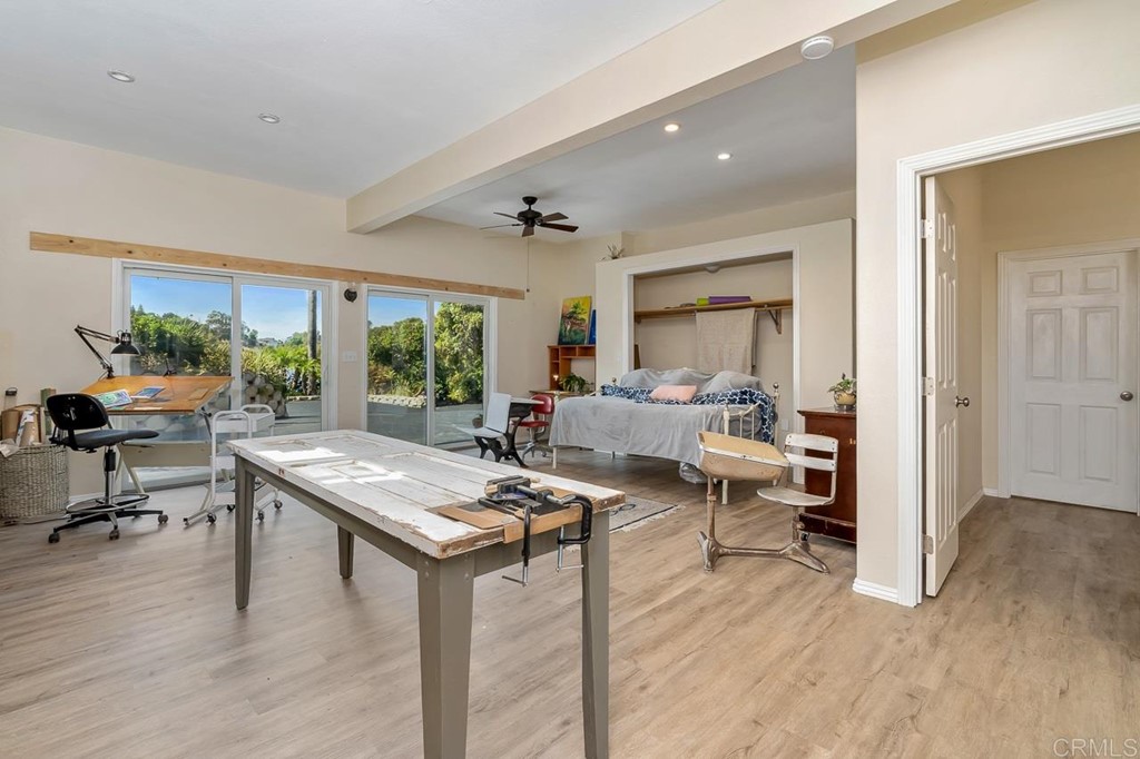 1239 Jamacha Road El Cajon, CA 92019 - Photo 18 of 24 a living room with furniture and large windows