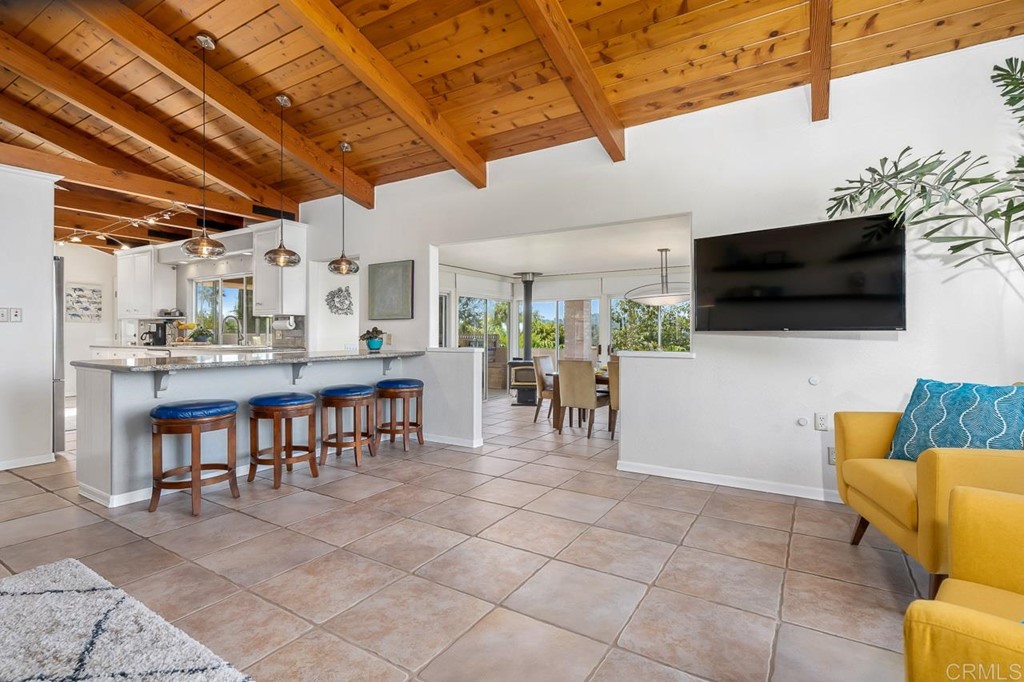 1239 Jamacha Road El Cajon, CA 92019 - Photo 5 of 24 a view of a livingroom with furniture and a flat screen tv