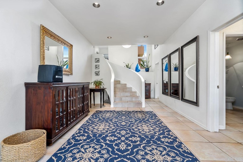 1239 Jamacha Road El Cajon, CA 92019 - Photo 8 of 24 a view of entryway with a rug and a window
