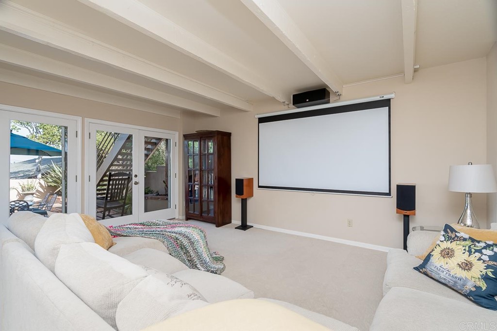 1239 Jamacha Road El Cajon, CA 92019 - Photo 10 of 24 a living room with furniture and a flat screen tv