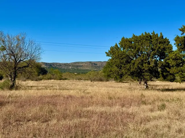 a view of mountain view with trees