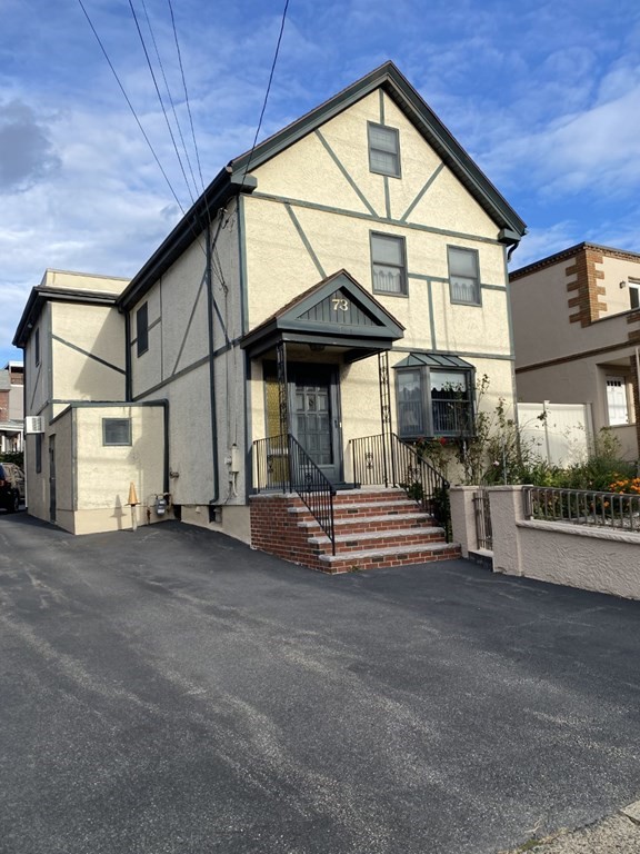 a view of the house with a street
