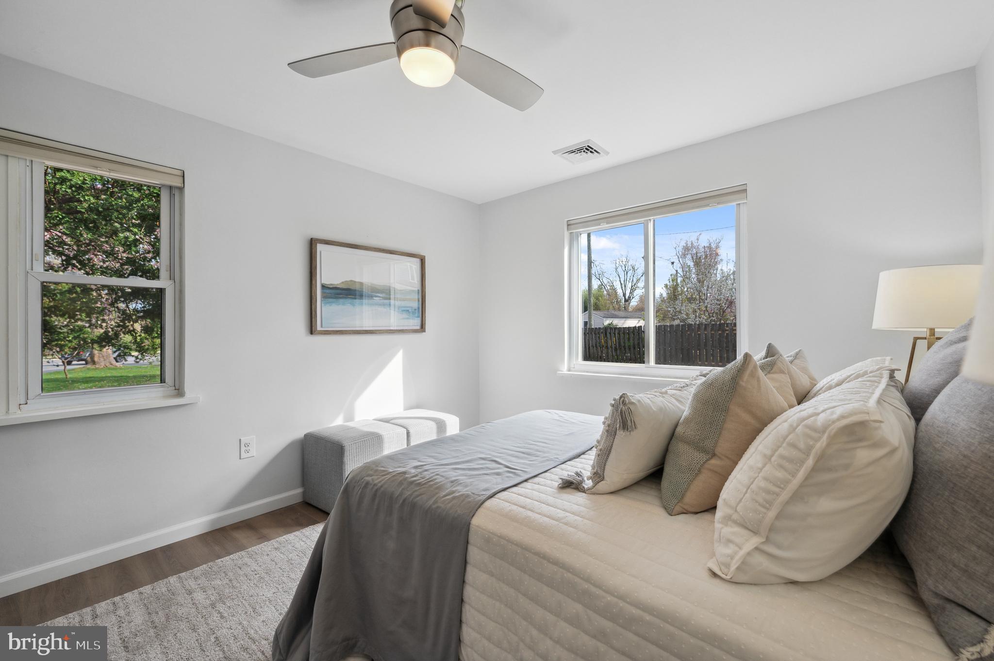 2210 Sproul Road Broomall, PA 19008 - Photo 18 of 26 a bedroom with a bed and a window