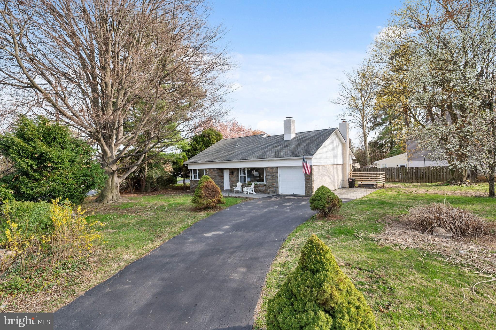 2210 Sproul Road Broomall, PA 19008 - Photo 2 of 26 a view of a front of a house with a yard