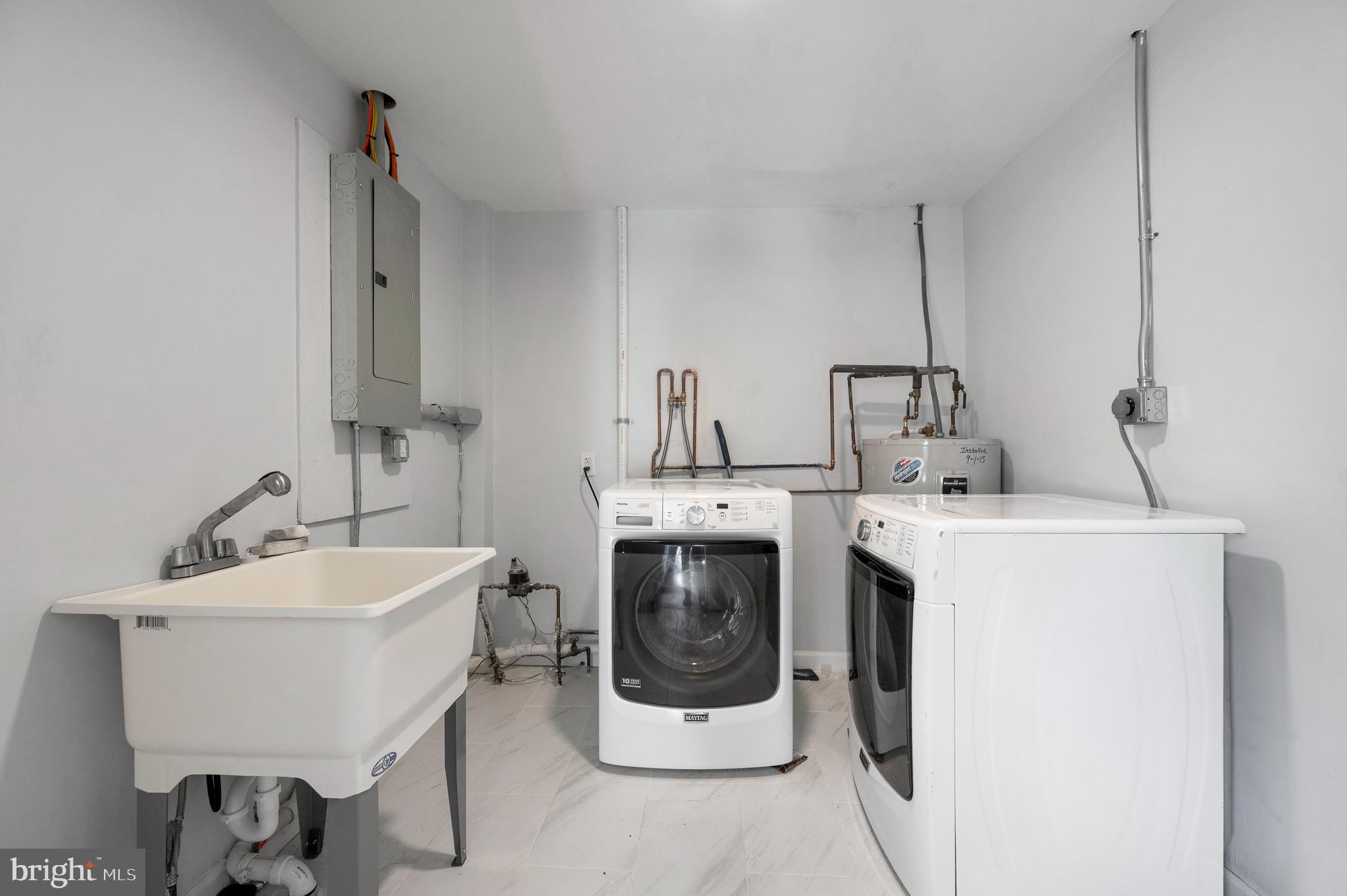 2210 Sproul Road Broomall, PA 19008 - Photo 24 of 26 a utility room with dryer and washer