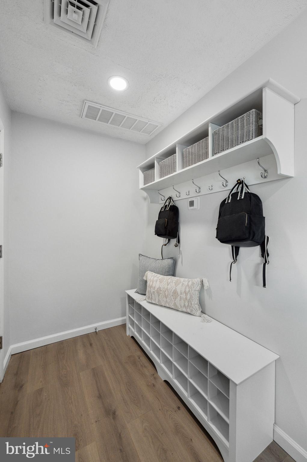 2210 Sproul Road Broomall, PA 19008 - Photo 25 of 26 a spacious bedroom with a bed and cabinets