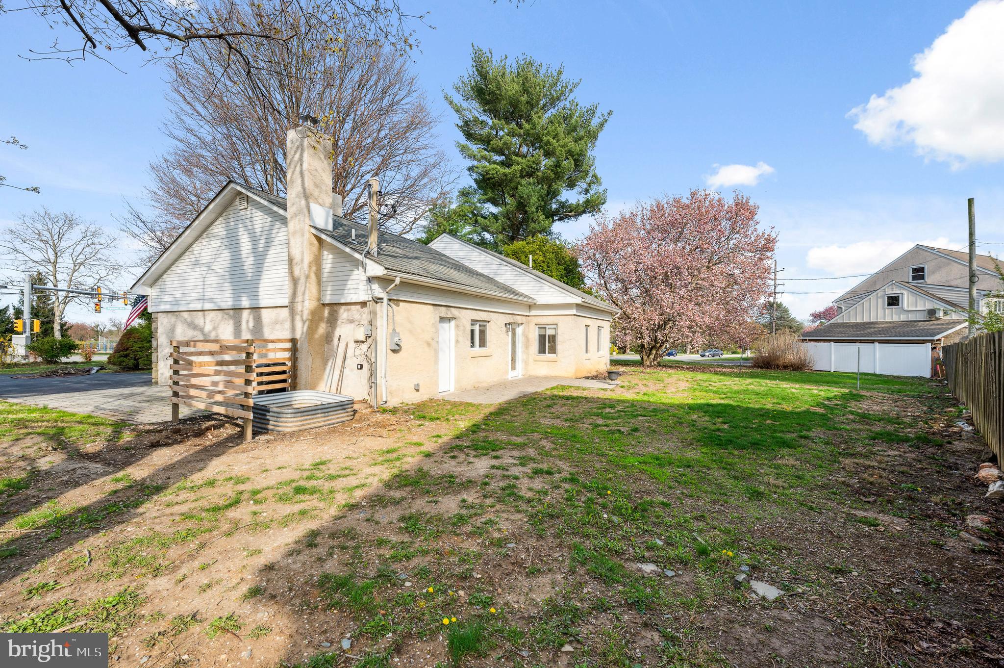 2210 Sproul Road Broomall, PA 19008 - Photo 26 of 26 a view of a house with a yard