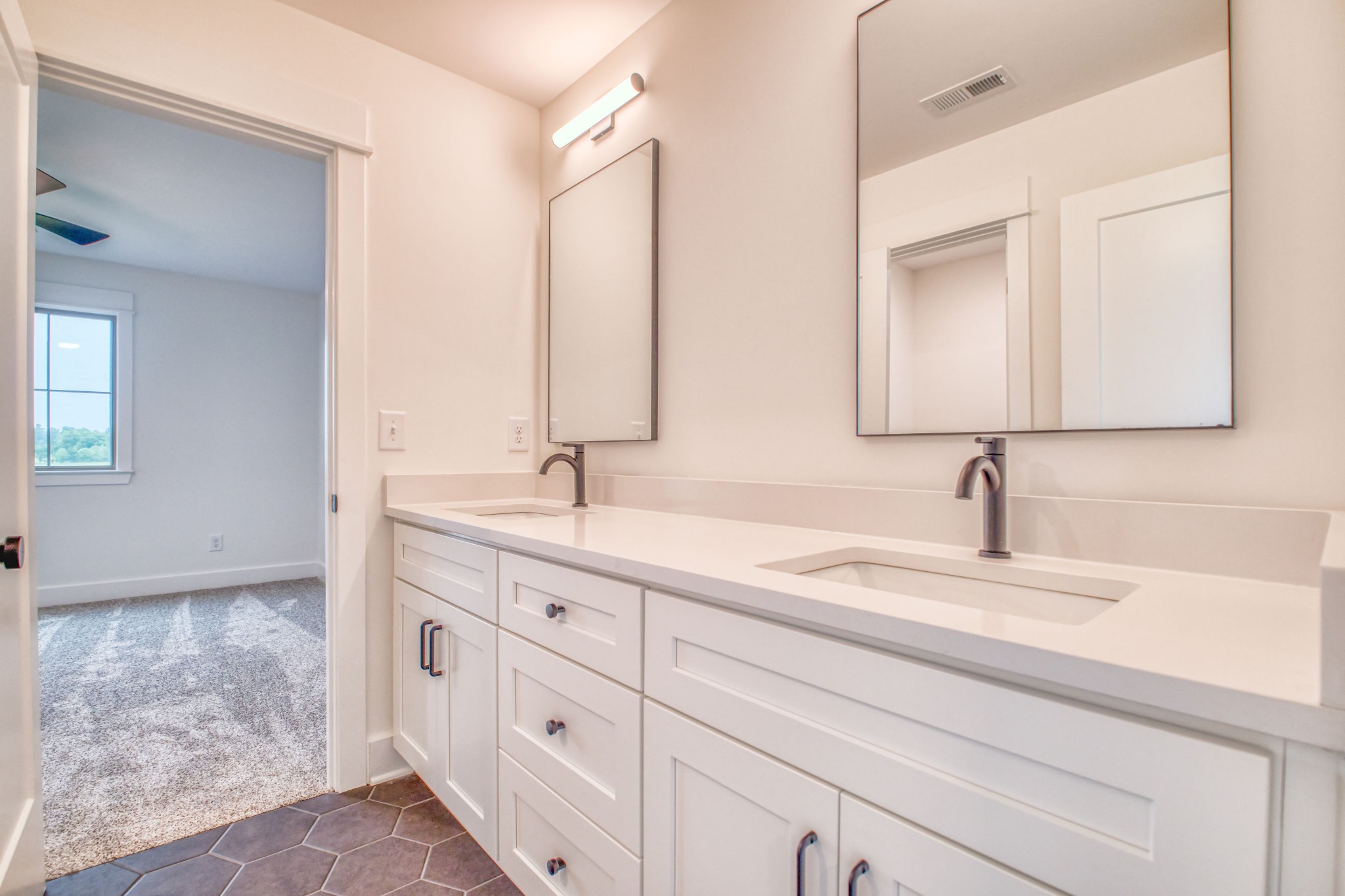 5863 Lakeview Road Springfield, TN 37172 - Photo 54 of 66 a bathroom with double sink and a mirror