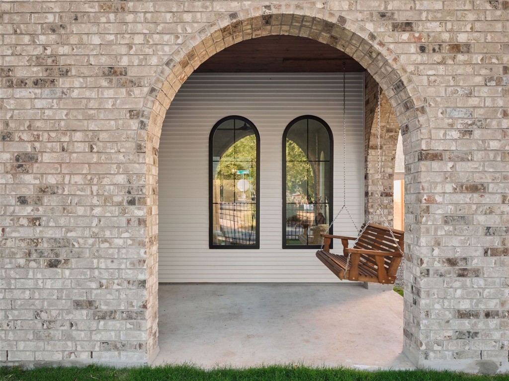 610 Allen Street, Unit 1 Austin, TX 78702 - Photo 2 of 32 View of exterior entry with brick siding