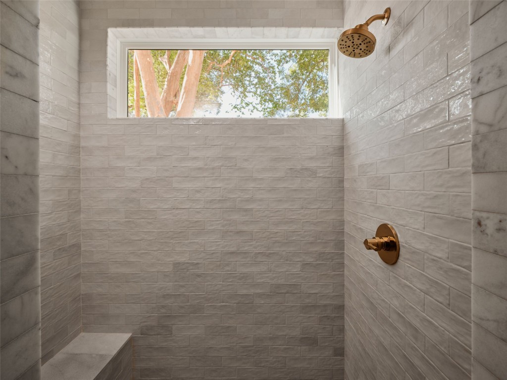 610 Allen Street, Unit 1 Austin, TX 78702 - Photo 24 of 32 Full bath featuring a tile shower