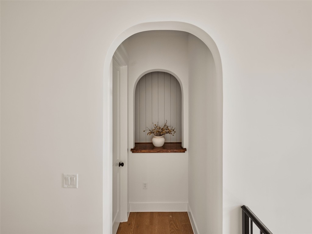 610 Allen Street, Unit 1 Austin, TX 78702 - Photo 25 of 32 Hall featuring baseboards and wood finished floors