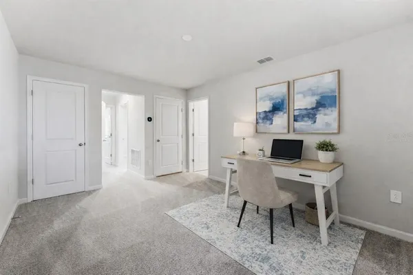 an empty room with windows