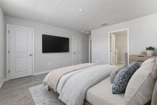 a bathroom with double sink and a mirror