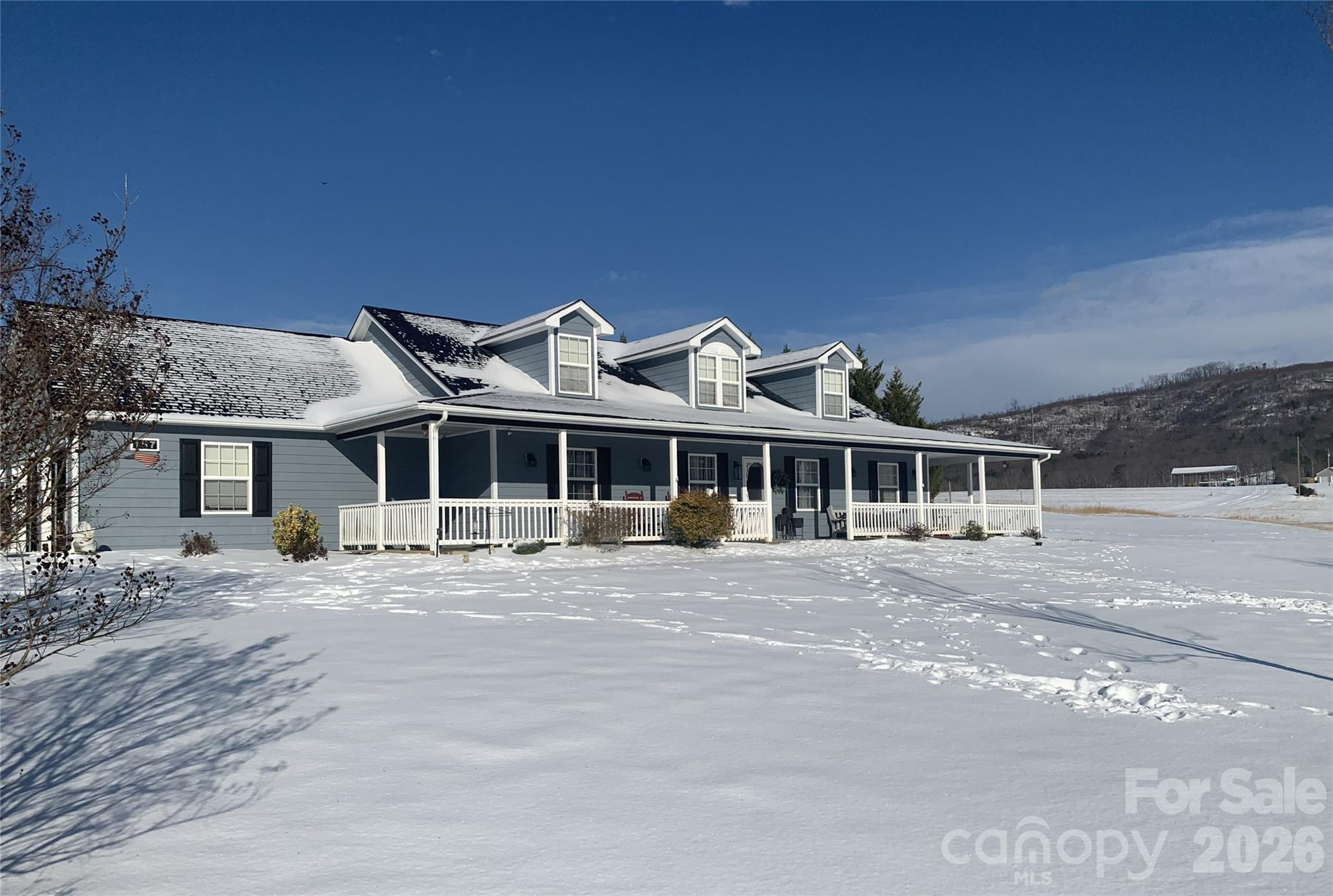 157 Cherry Ridge Drive Bostic, NC 28018 - Photo 1 of 1 a front view of a house with a garden and pathway