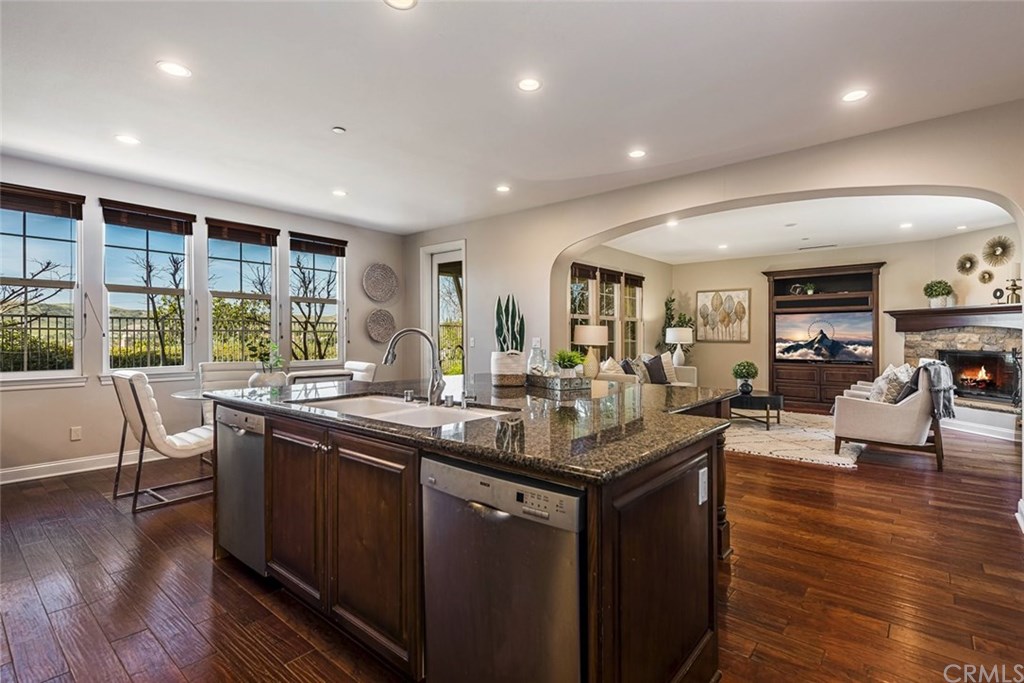 Entertainers kitchen with abundant counter seating and open views of the Family Room.