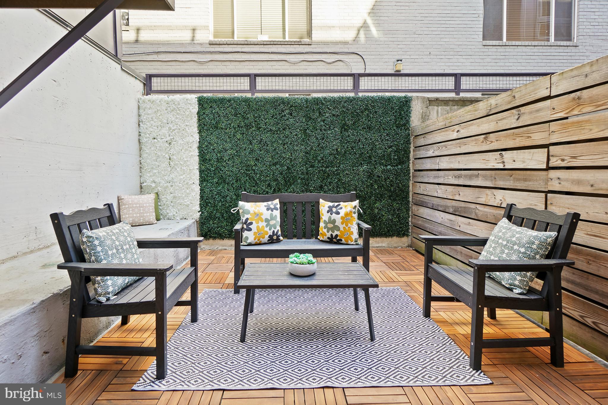 1443 Chapin Street Northwest, Unit 103 Washington, DC 20009 - Photo 20 of 30 New parquet tiles & faux greenery wall