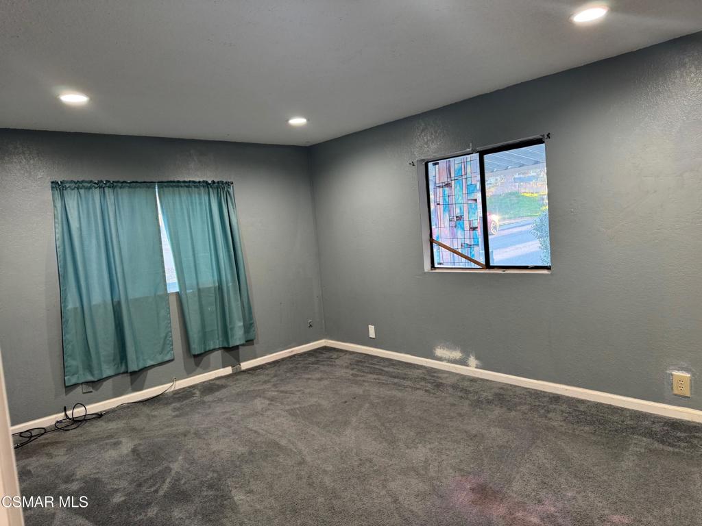 40701 Rancho Vista Boulevard, Unit 76 Palmdale, CA 93551 - Photo 14 of 31 an empty room with a window