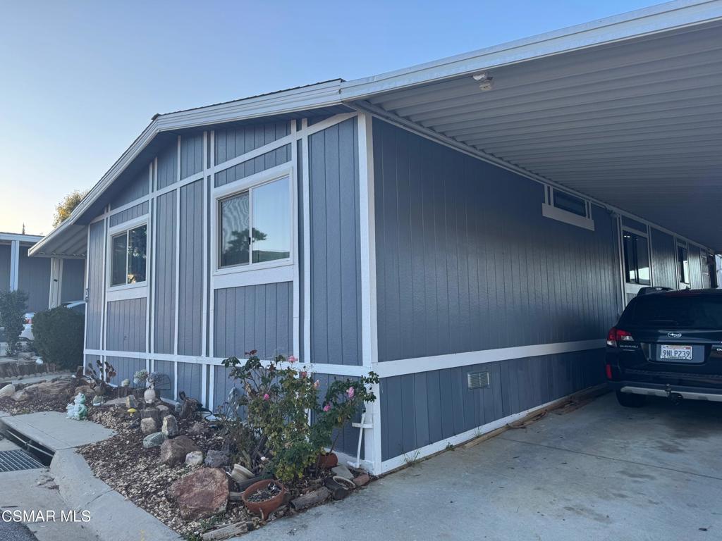 40701 Rancho Vista Boulevard, Unit 76 Palmdale, CA 93551 - Photo 2 of 31 a view of a car garage