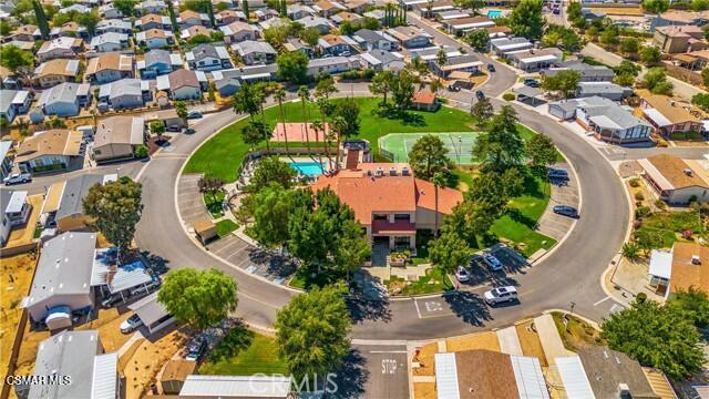 40701 Rancho Vista Boulevard, Unit 76 Palmdale, CA 93551 - Photo 25 of 31 an aerial view of residential houses with outdoor space and street view