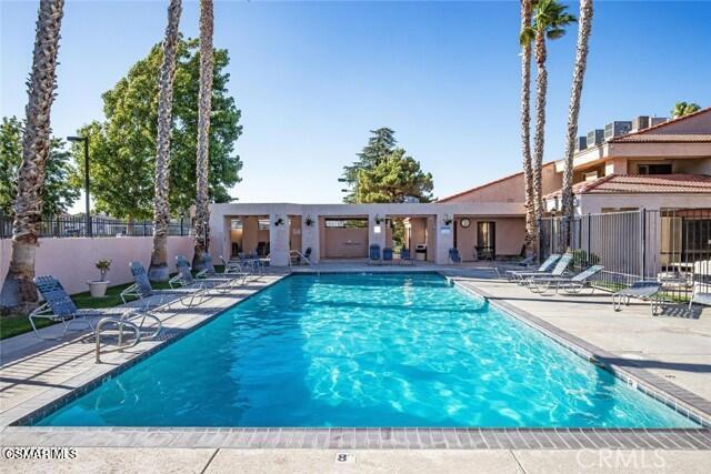 40701 Rancho Vista Boulevard, Unit 76 Palmdale, CA 93551 - Photo 26 of 31 swimming pool view with a seating space