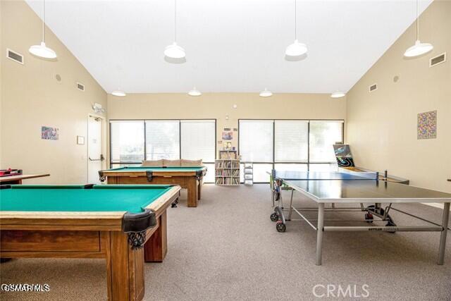 40701 Rancho Vista Boulevard, Unit 76 Palmdale, CA 93551 - Photo 27 of 31 a room with furniture and a large window