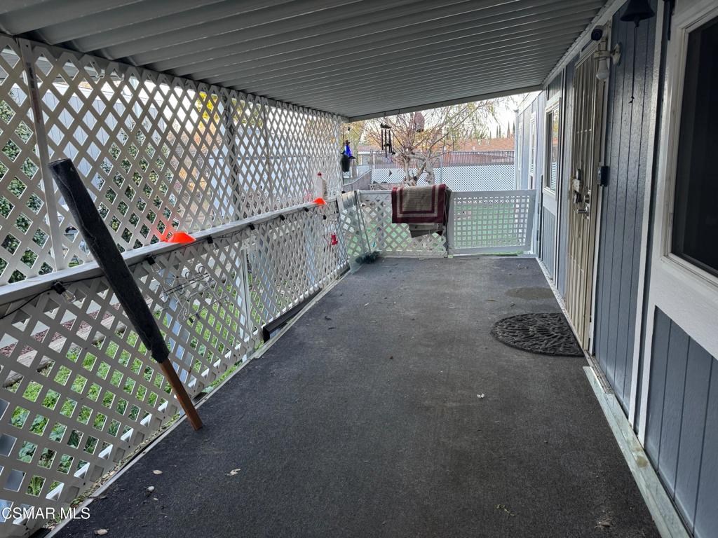 40701 Rancho Vista Boulevard, Unit 76 Palmdale, CA 93551 - Photo 5 of 31 a view of outdoor space and deck