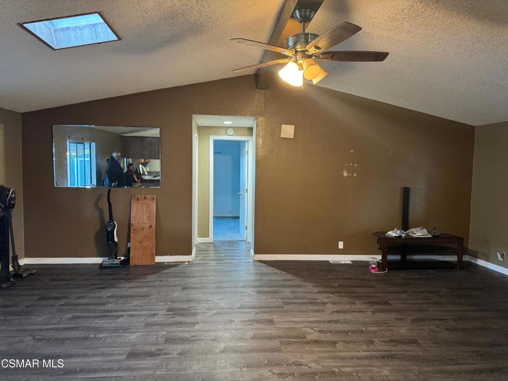40701 Rancho Vista Boulevard, Unit 76 Palmdale, CA 93551 - Photo 7 of 31 a view of a livingroom with wooden floor