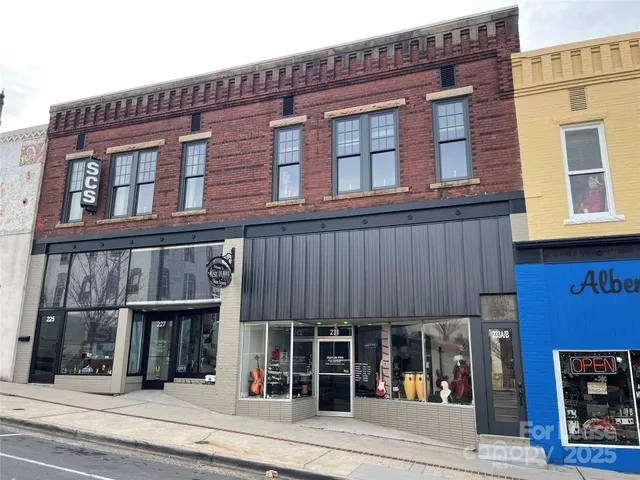 an empty room with wooden floor