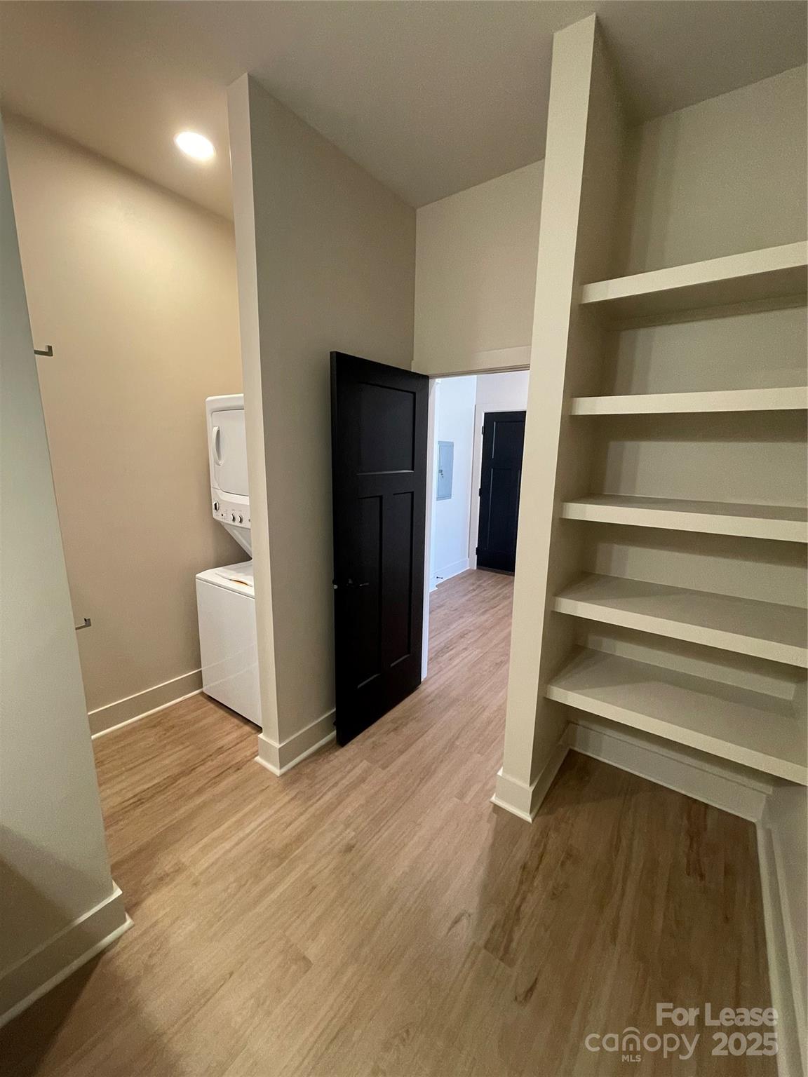 233 West Main Street, Unit A Albemarle, NC 28001 - Photo 10 of 10 a view of entryway with wooden floor and stairs