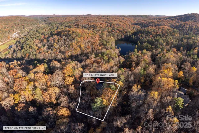 an aerial view of residential house and outdoor space