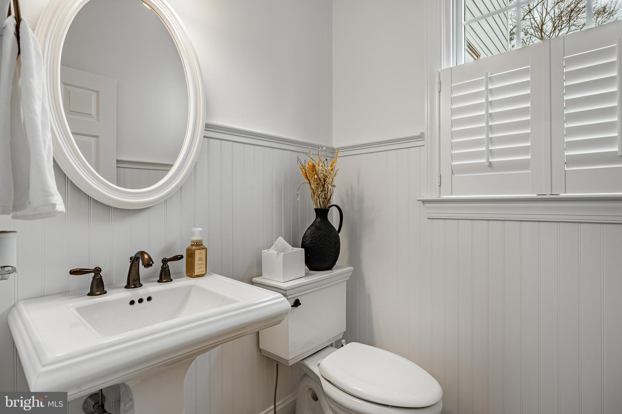 4 Amanda Lane West Chester, PA 19380 - Photo 15 of 108 a bathroom with a sink a toilet and a mirror