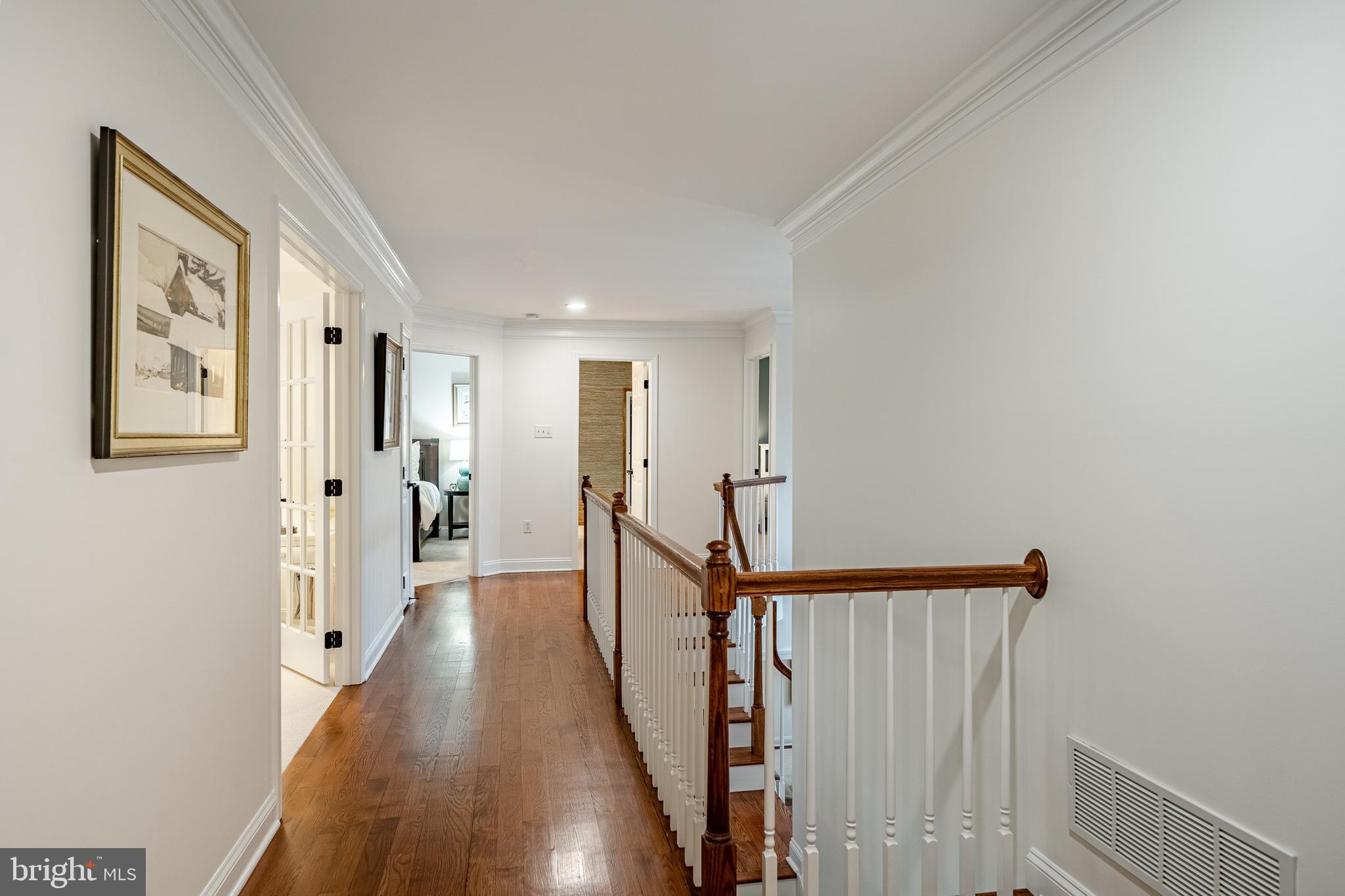 4 Amanda Lane West Chester, PA 19380 - Photo 31 of 108 a view of a hallway with wooden floor and staircase