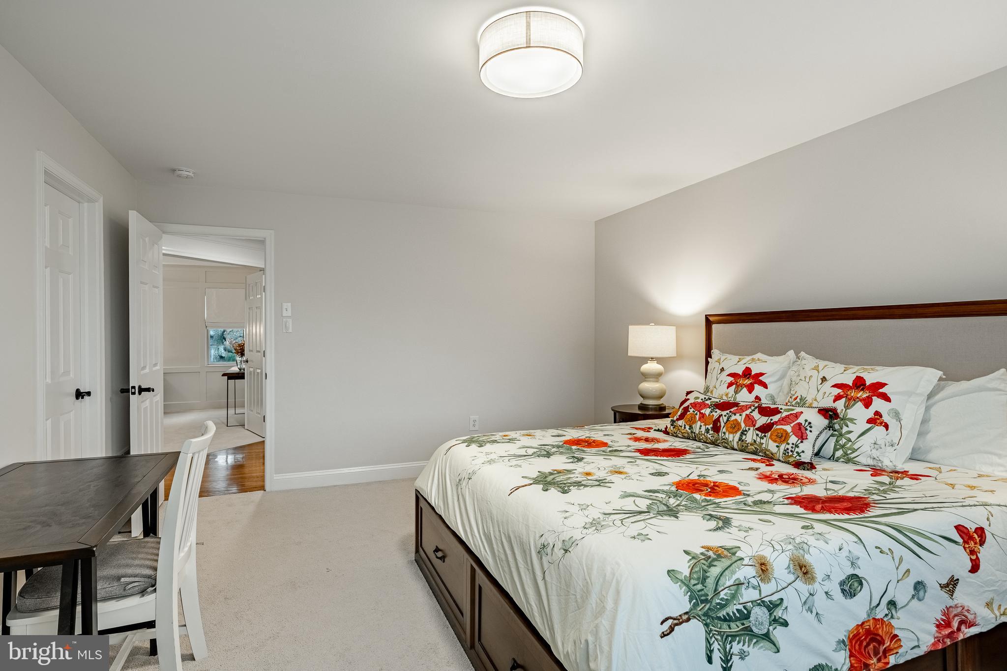 4 Amanda Lane West Chester, PA 19380 - Photo 37 of 108 a bedroom with a bed and a chandelier