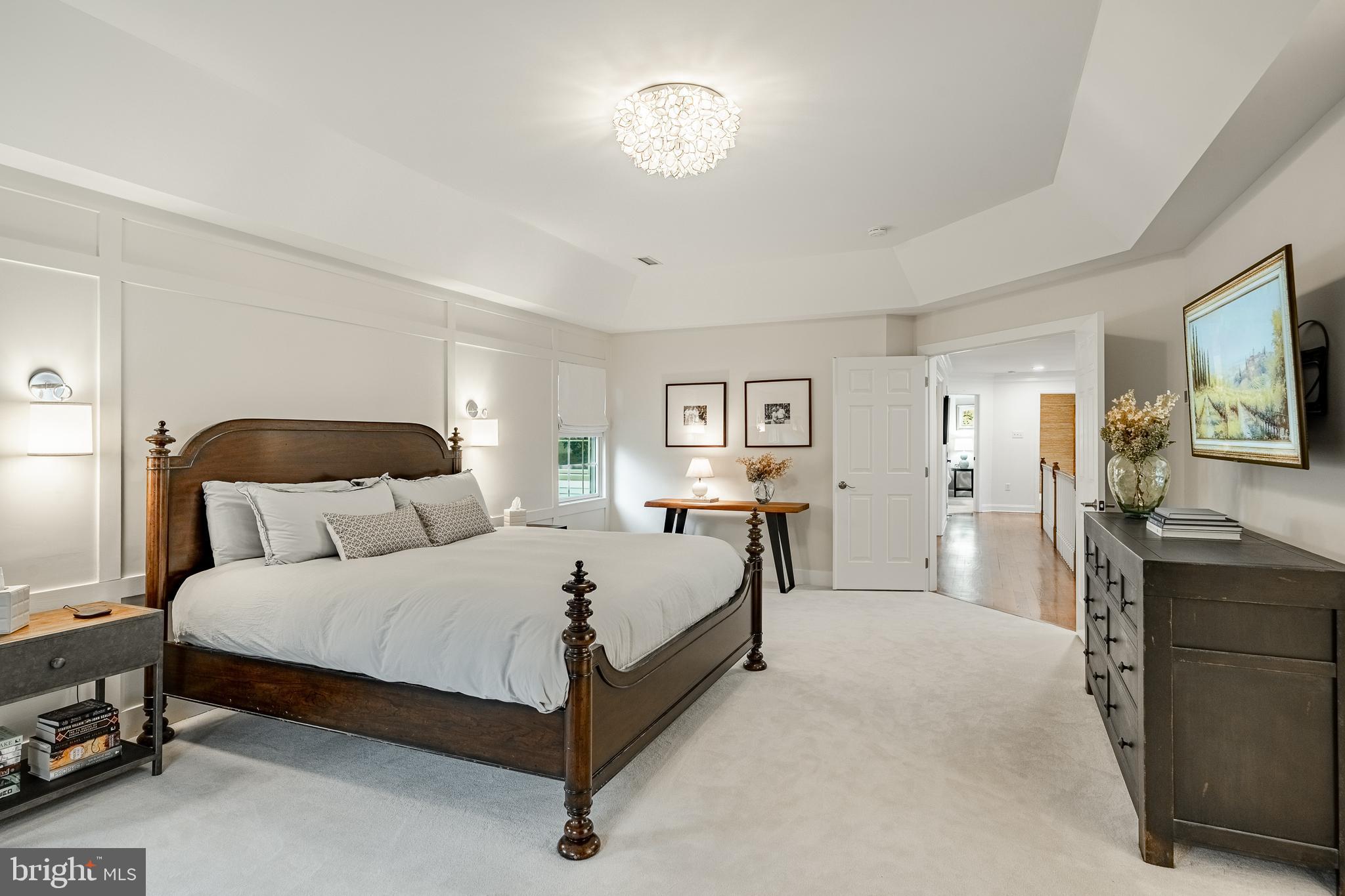 4 Amanda Lane West Chester, PA 19380 - Photo 42 of 108 a bedroom with a bed and a flat tv screen on dresser