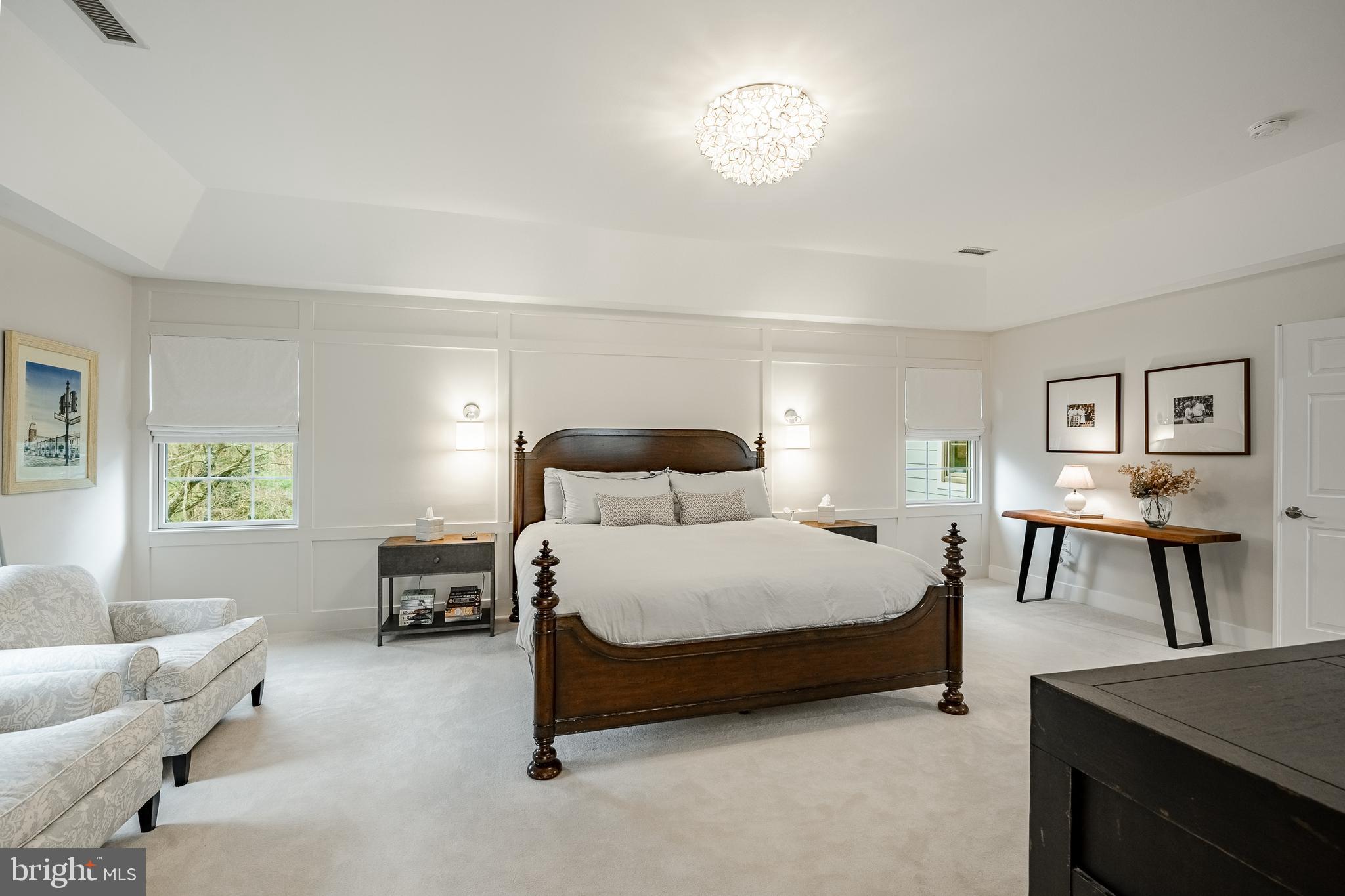 4 Amanda Lane West Chester, PA 19380 - Photo 43 of 108 a bedroom with a bed and a chandelier