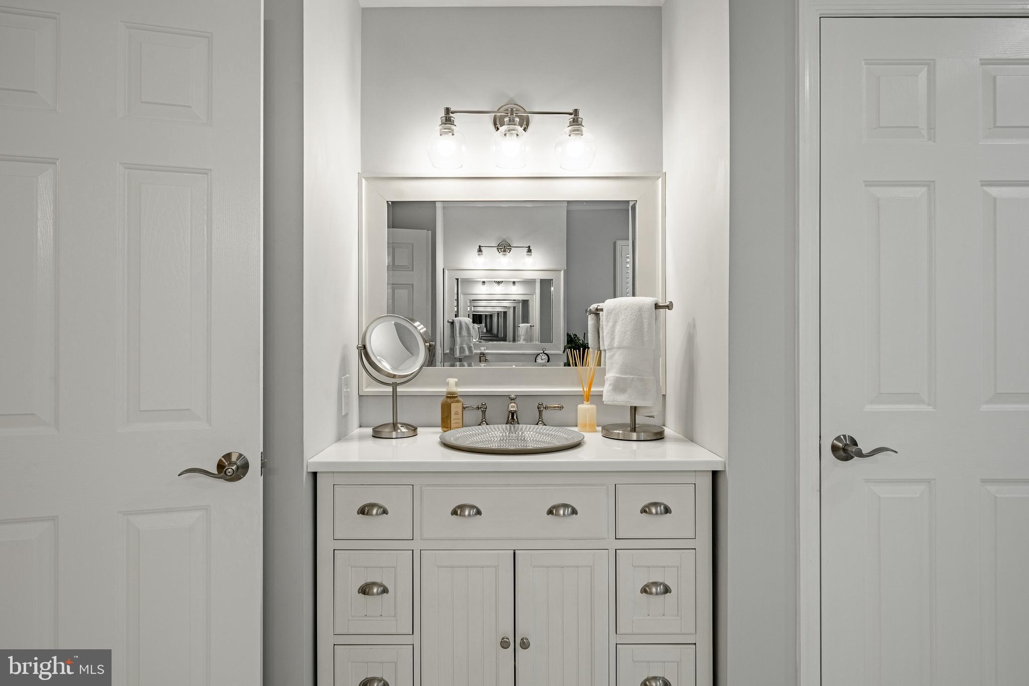 4 Amanda Lane West Chester, PA 19380 - Photo 49 of 108 a bathroom with a sink vanity and a mirror