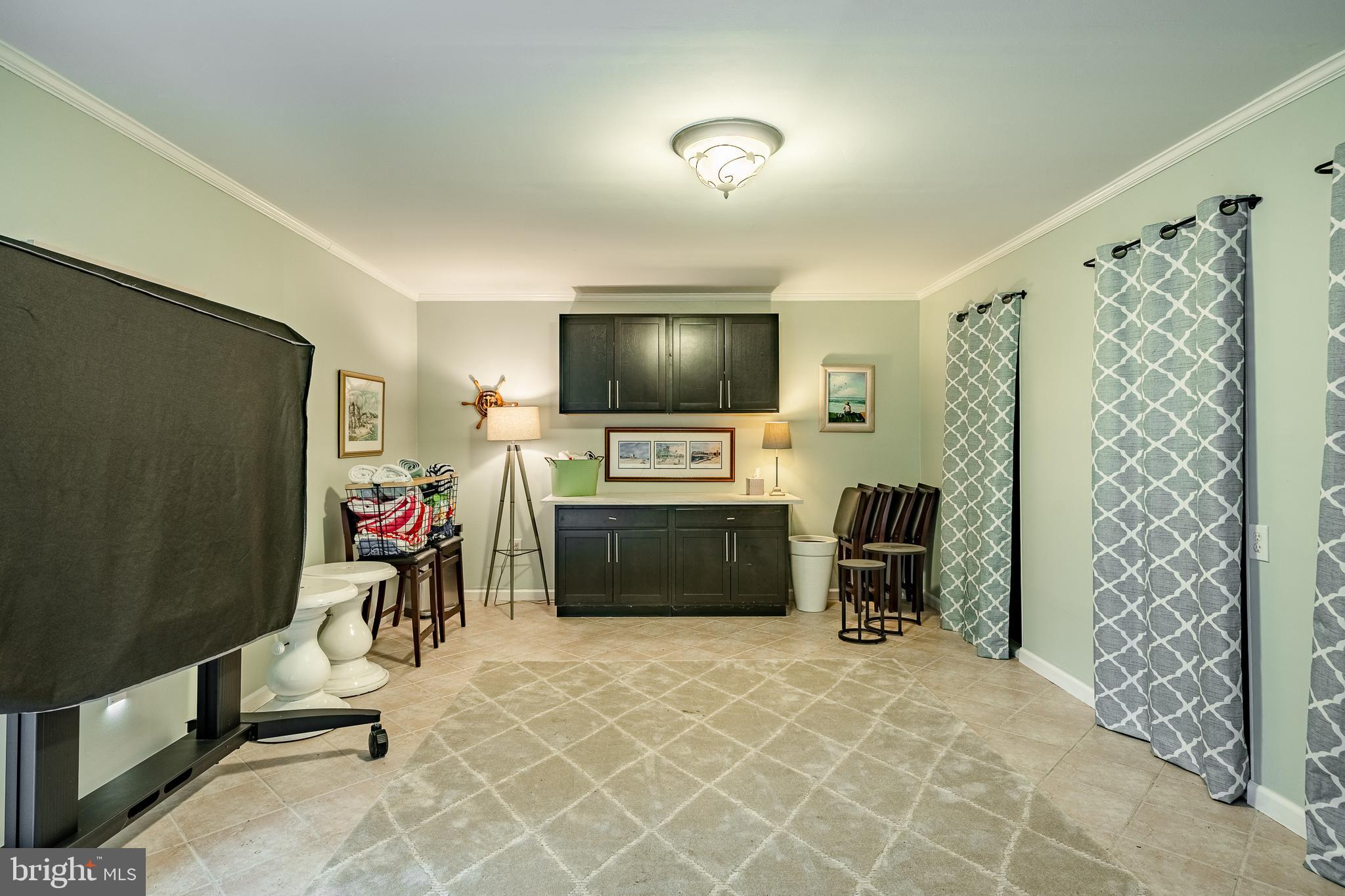 4 Amanda Lane West Chester, PA 19380 - Photo 59 of 108 a living room with furniture and a flat screen tv