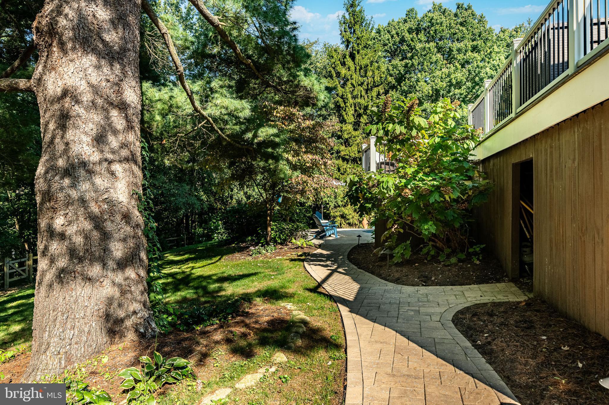 4 Amanda Lane West Chester, PA 19380 - Photo 76 of 108 a backyard of a house with lots of green space