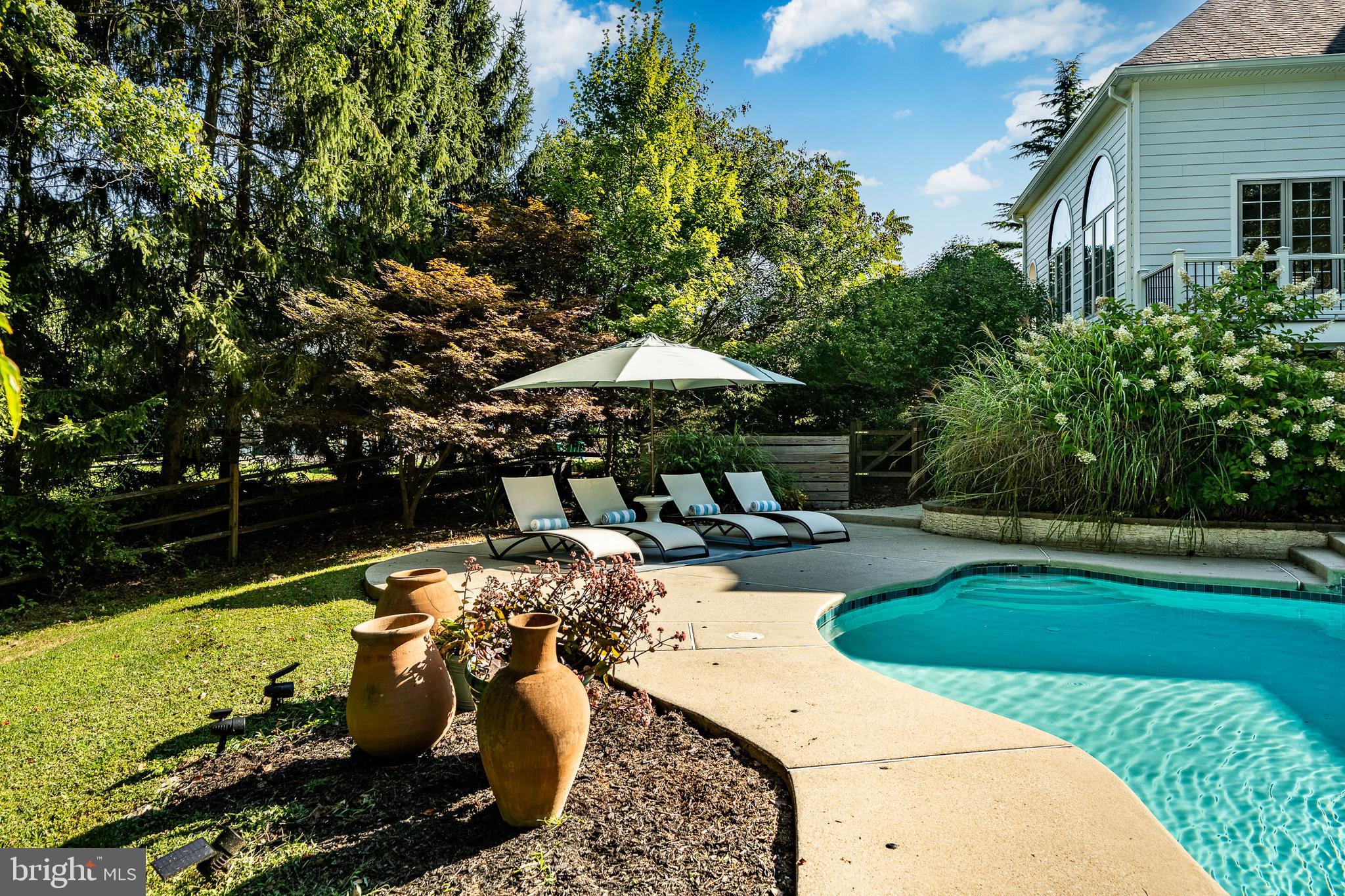 4 Amanda Lane West Chester, PA 19380 - Photo 79 of 108 a view of a swimming pool with a patio