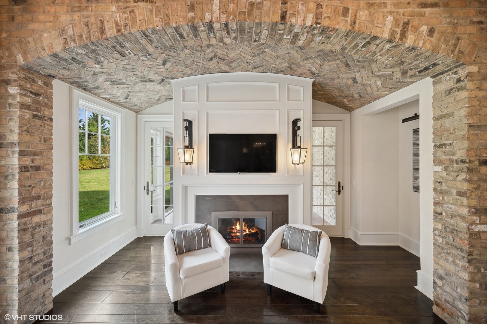 931 Sunset Road Winnetka, IL 60093 - Photo 16 of 42 a living room with furniture and a fireplace