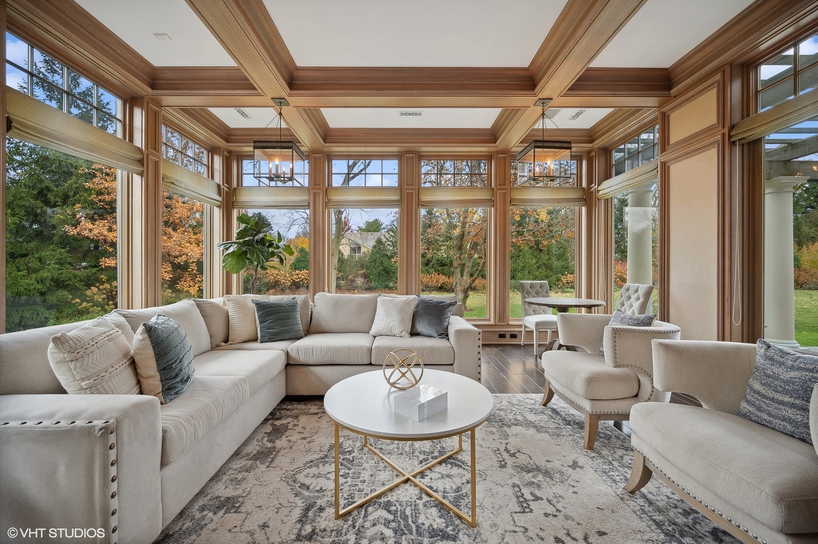 931 Sunset Road Winnetka, IL 60093 - Photo 22 of 42 a living room with furniture and a large window