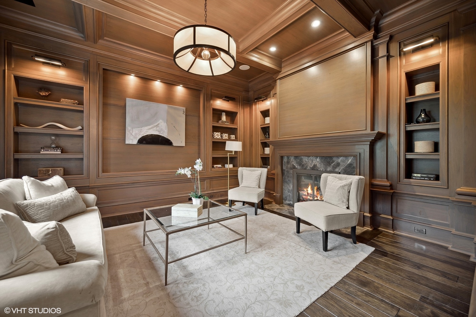 931 Sunset Road Winnetka, IL 60093 - Photo 23 of 42 a living room with furniture a chandelier and a large window